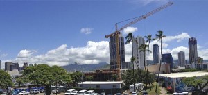 Halekauwila Place, whose crane is shown in the foreground, is one of 15 condominium projects known to be in the works in Kakaako. If all of the projects go forward, more than 4,000 units will be added to the market in the next five years.